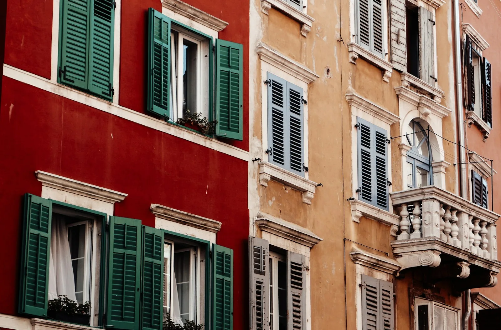 Colourful shuttered facades with a balcony in Rovinj old town