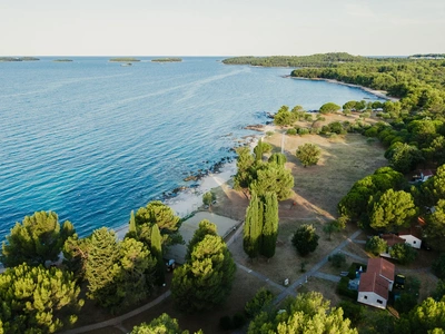 Rocky shore and the Rovinj islands