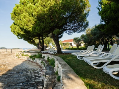 Sunbathing terraces by the shore