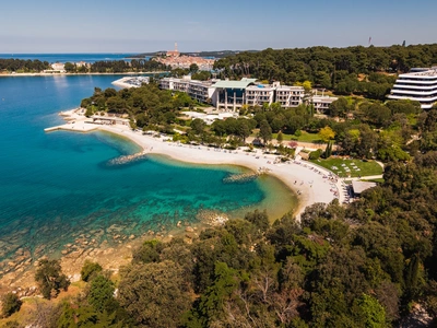 Mulini Bay with Rovinj old town in the distance