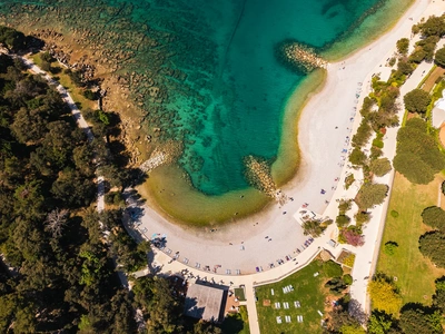 Top-down view of the curved main beach