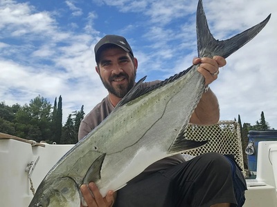 Captain Mati with a trophy leerfish on a Rovinj fishing trip — Rovinj