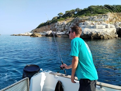 Casting the rocky shallows on a Rovinj fishing charter — Rovinj
